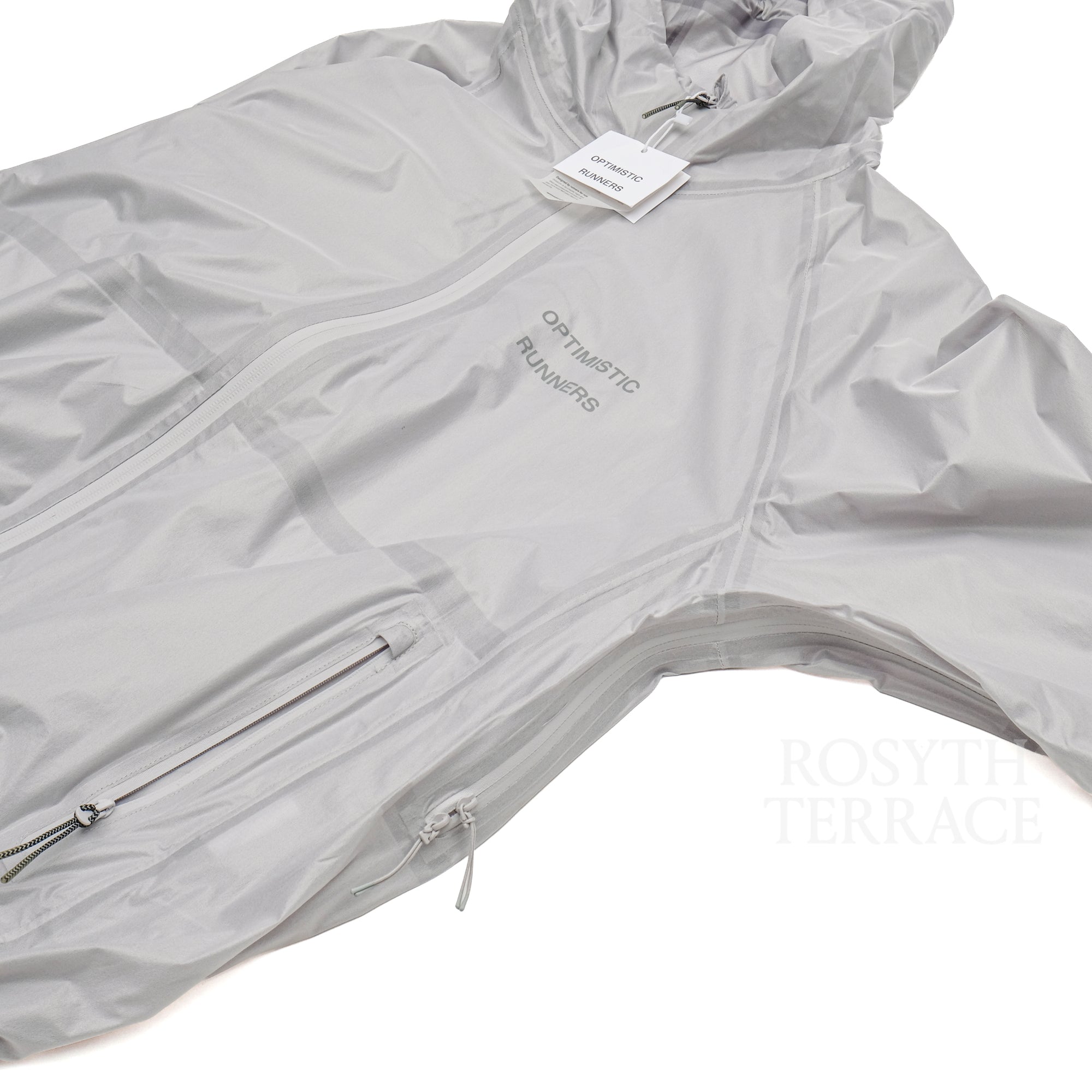 【OPTIMISTIC RUNNERS / PACKABLE MEMBRANE JACKET (COOL-GREY / SIZE L】